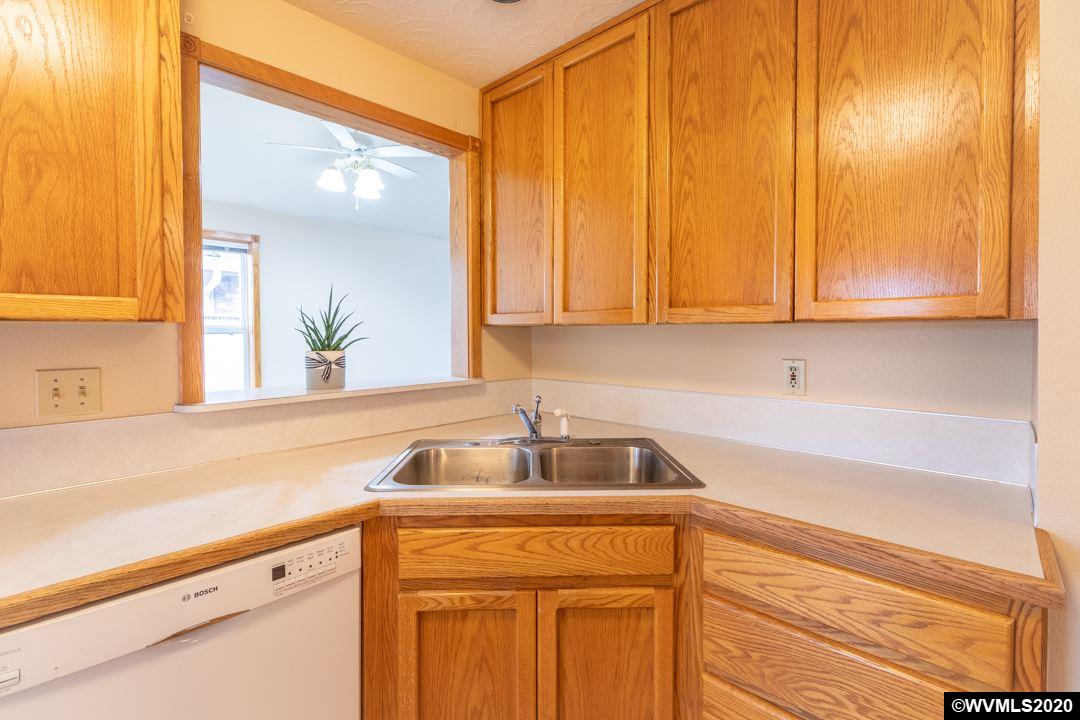 244 Edwards Road South Monmouth, OR 97361 - Photo 10 of 29 a kitchen with a sink and cabinets