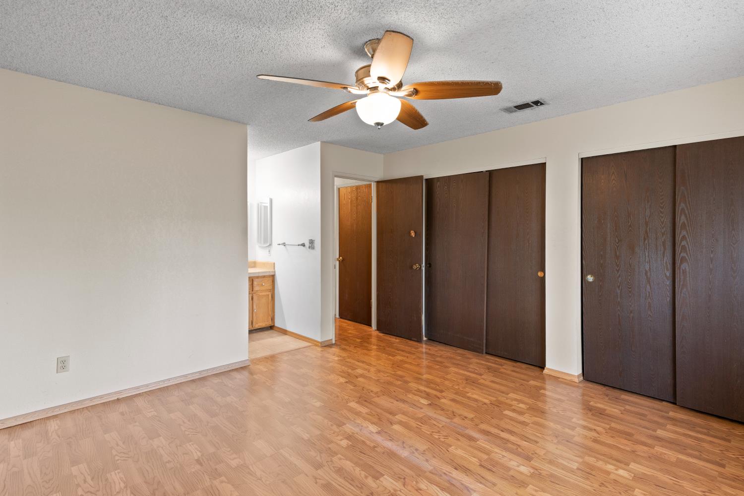 986 Pebble Way Manteca, CA 95336 - Photo 18 of 42 Primary bedroom
