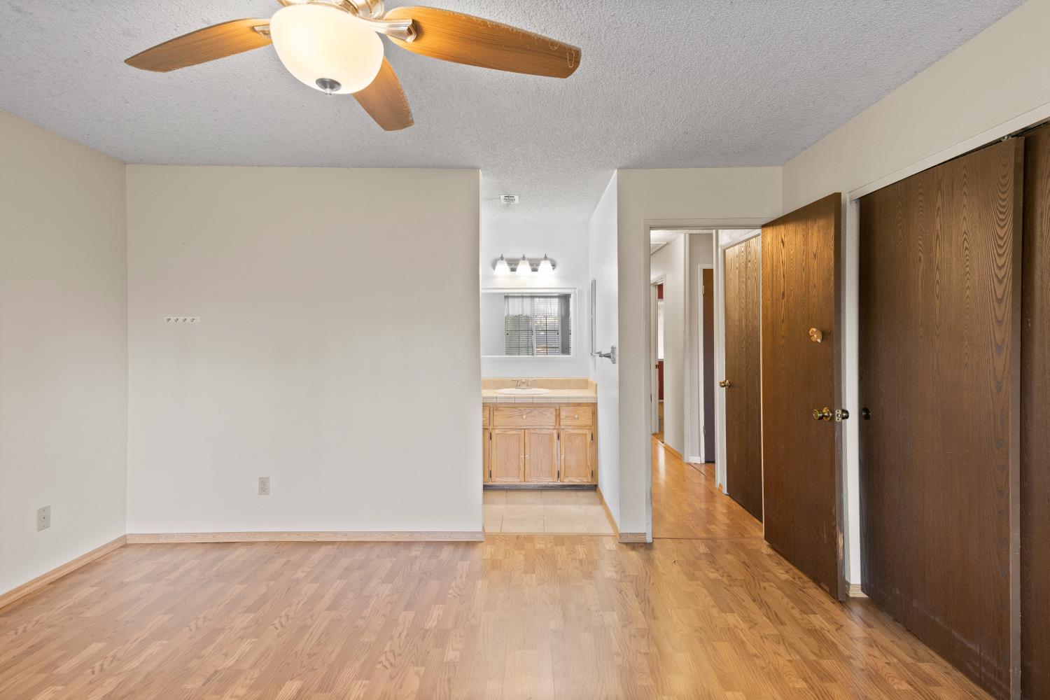 986 Pebble Way Manteca, CA 95336 - Photo 19 of 42 Primary bedroom