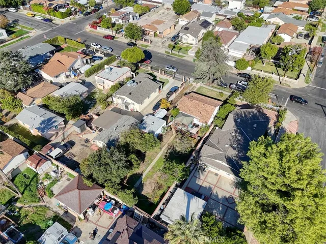 an aerial view of residential house with outdoor space