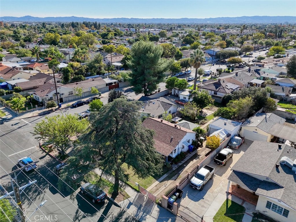 10007 Haddon Avenue Pacoima, CA 91331 - Photo 20 of 22 an aerial view of a city with lots of residential buildings