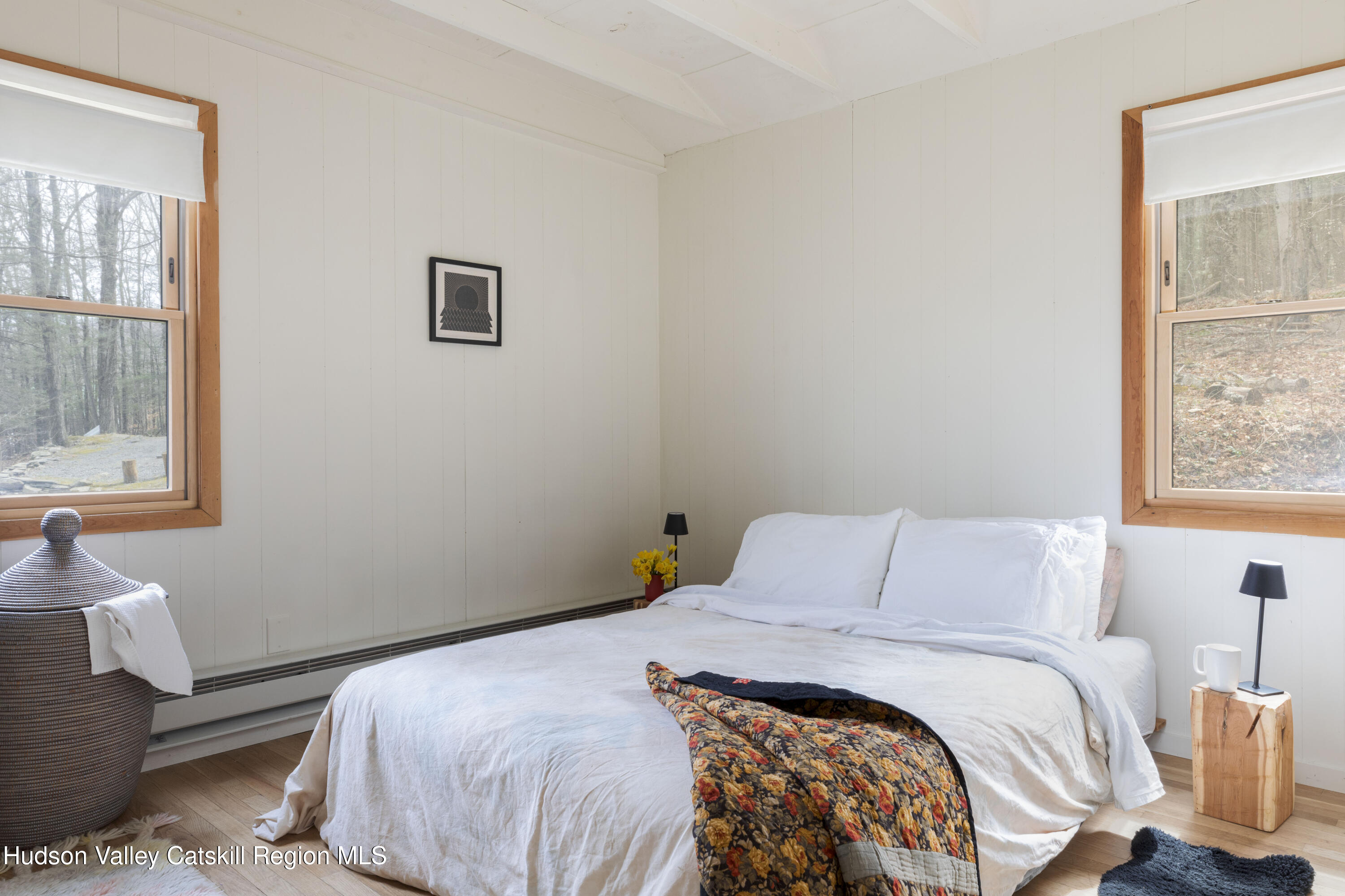 44 Smith Lane Grahamsville, NY 12740 - Photo 15 of 34 a bedroom with a bed and a window