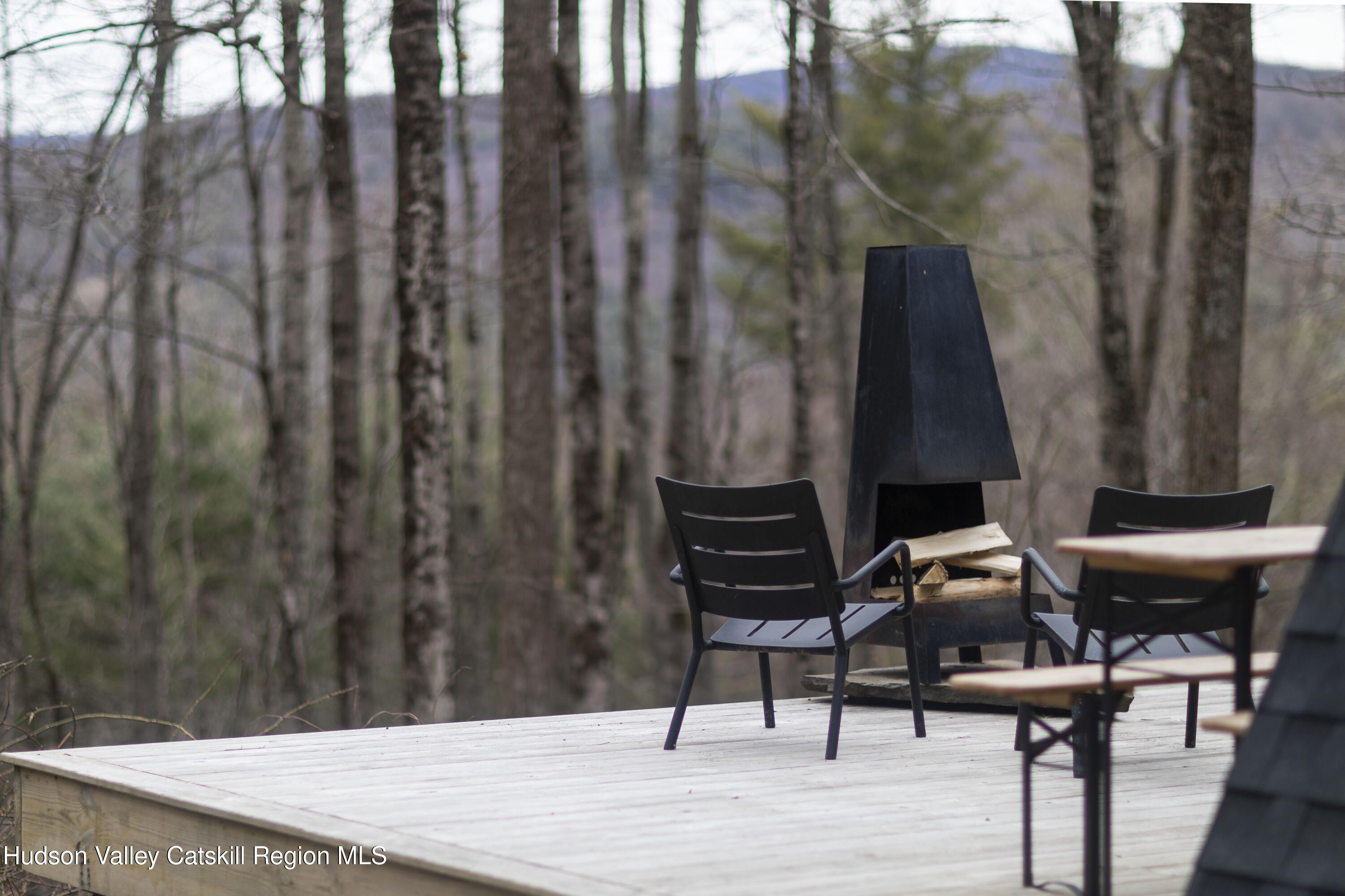 44 Smith Lane Grahamsville, NY 12740 - Photo 25 of 34 a view of a chairs and table in the wooden floor