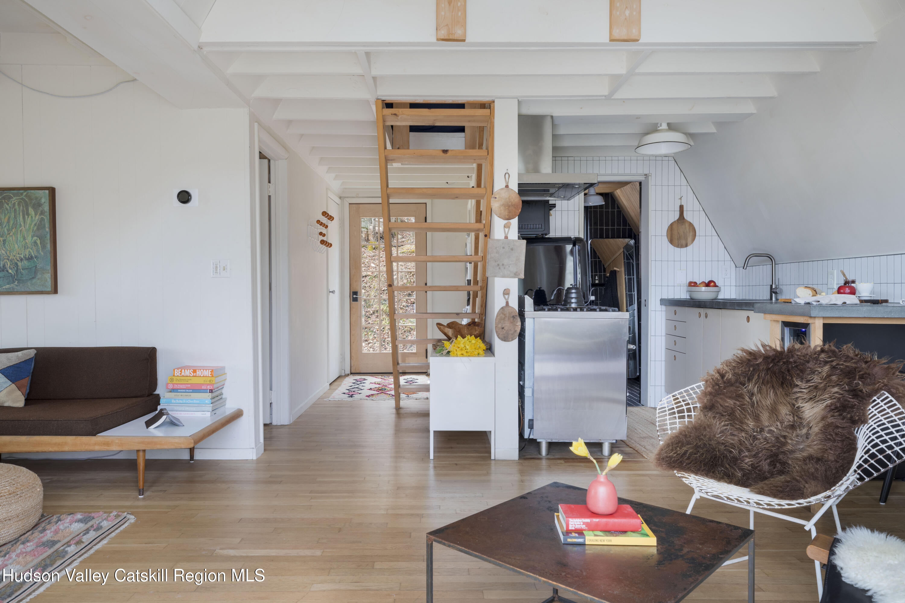 44 Smith Lane Grahamsville, NY 12740 - Photo 6 of 34 a living room with furniture and a flat screen tv