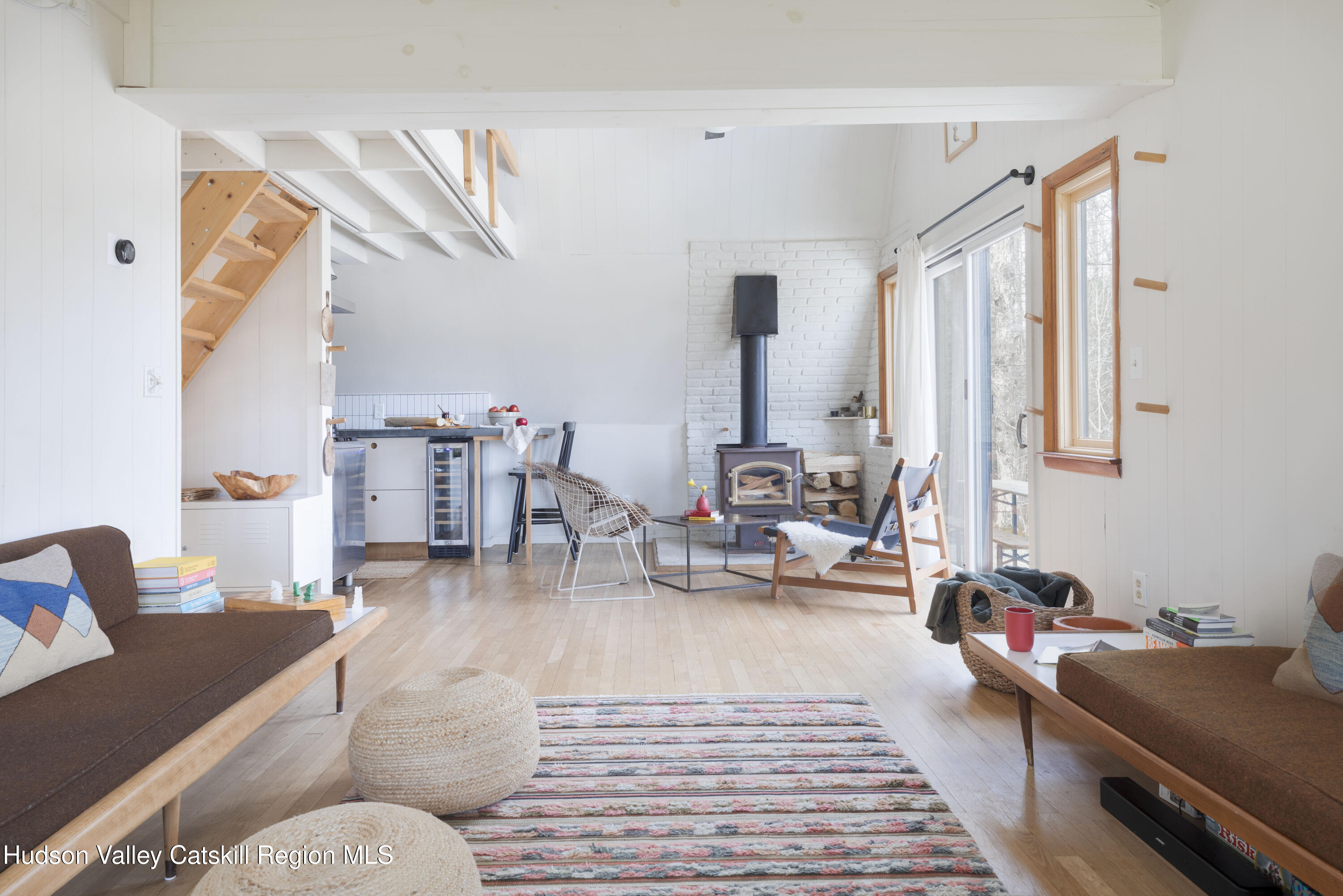 44 Smith Lane Grahamsville, NY 12740 - Photo 7 of 34 a living room with furniture and a rug