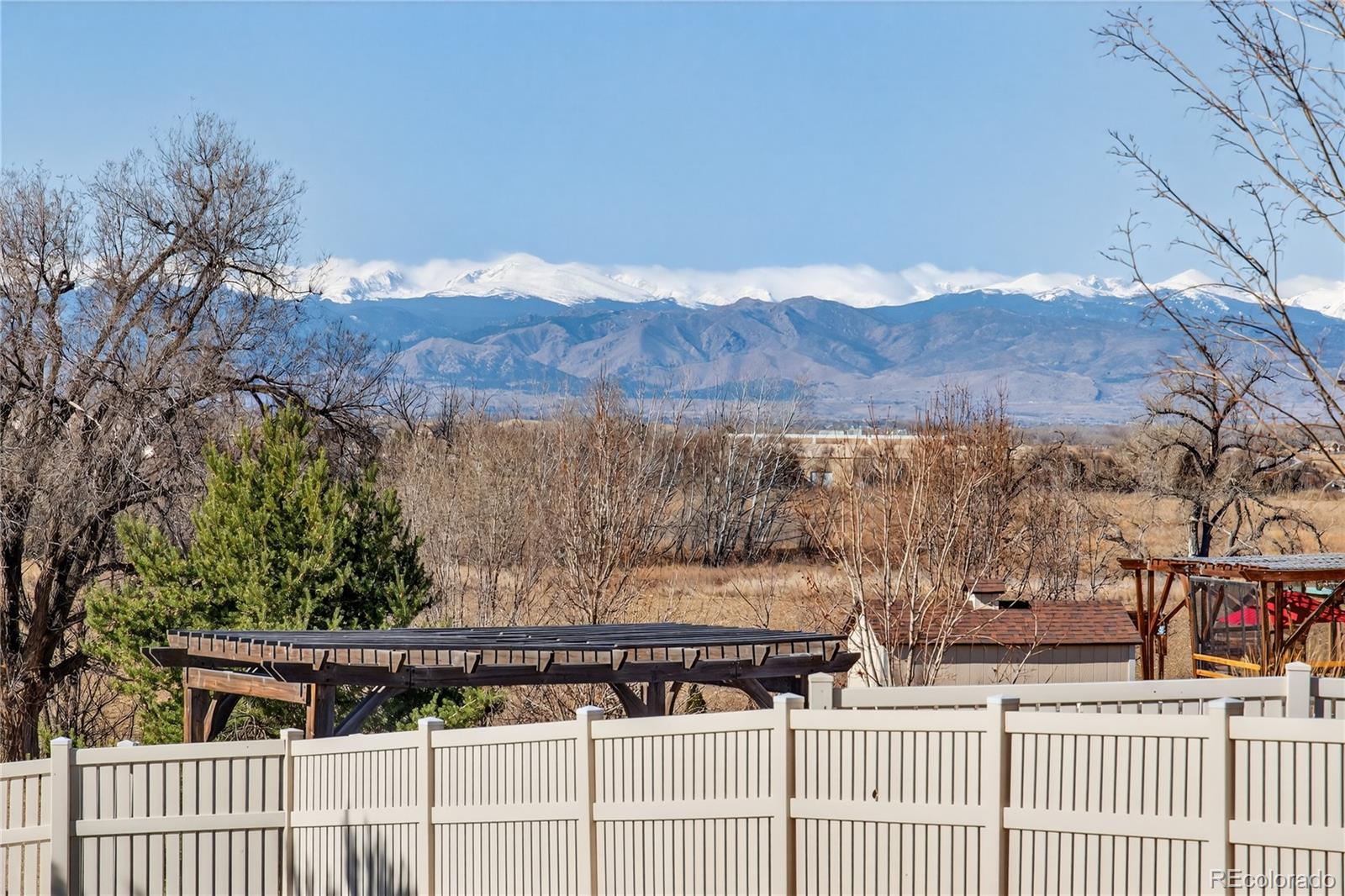 10180 Audrey Street Firestone, CO 80504 - Photo 3 of 46 a view of house with a yard