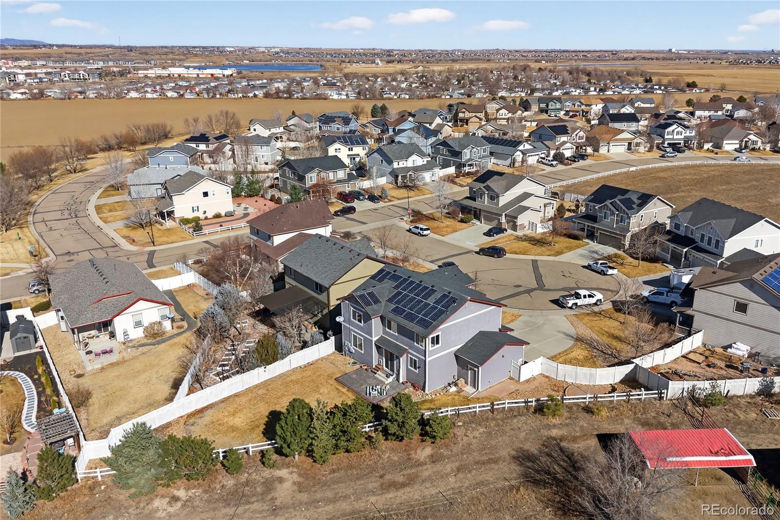 10180 Audrey Street Firestone, CO 80504 - Photo 40 of 46 an aerial view of a city with lots of residential buildings