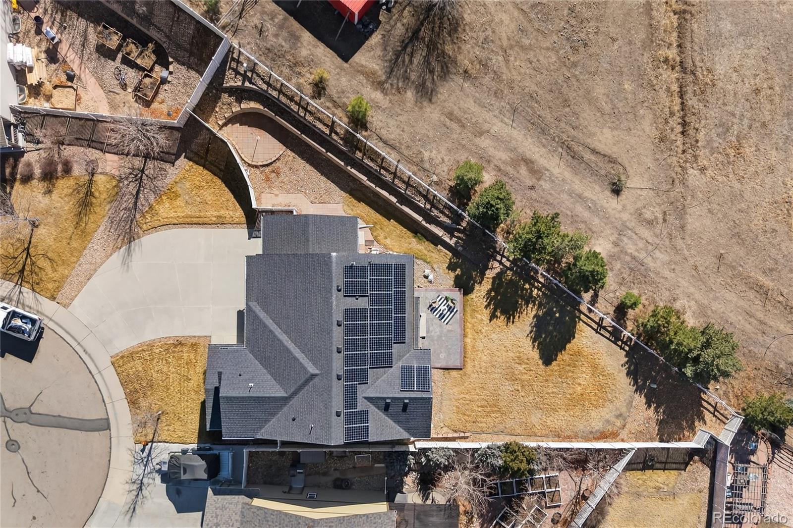 10180 Audrey Street Firestone, CO 80504 - Photo 41 of 46 a aerial view of a house with a yard