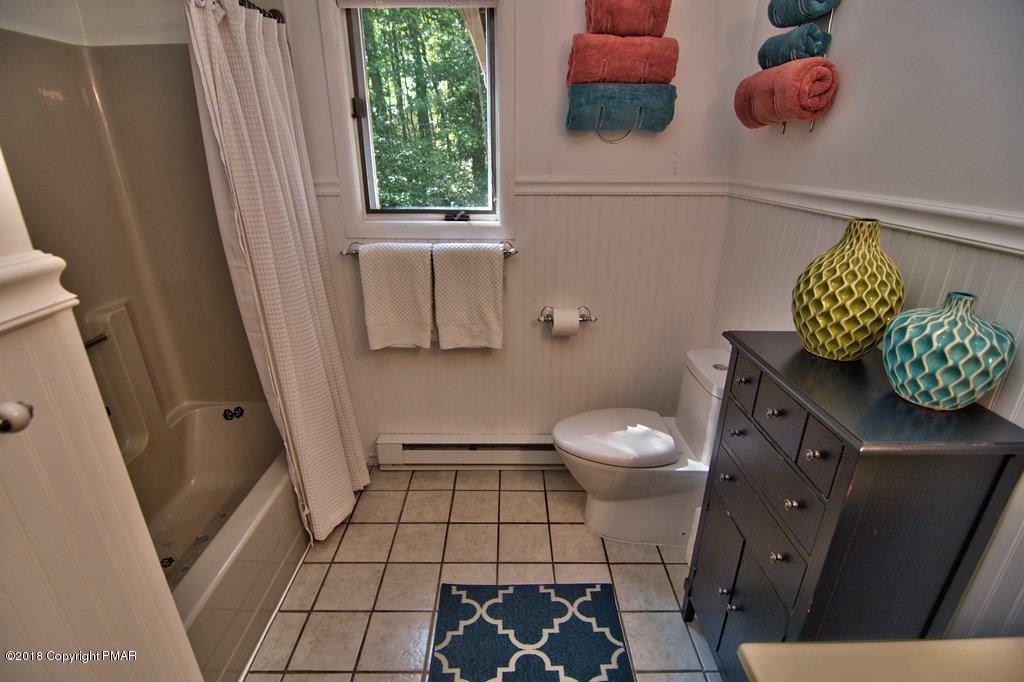 131 Powderhorn Road Long Pond, PA 18334 - Photo 33 of 54 a bathroom with a toilet and a sink