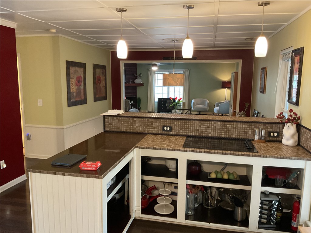229 Cub Cove Drive Walhalla, SC 29691 - Photo 11 of 50 This kitchen features a practical layout with integrated cooking surfaces, ideal for everyday living.