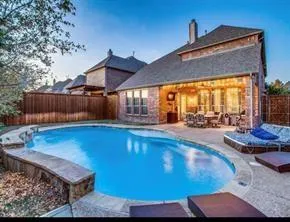 a view of a backyard with a patio