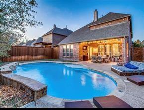 a view of a backyard with a patio