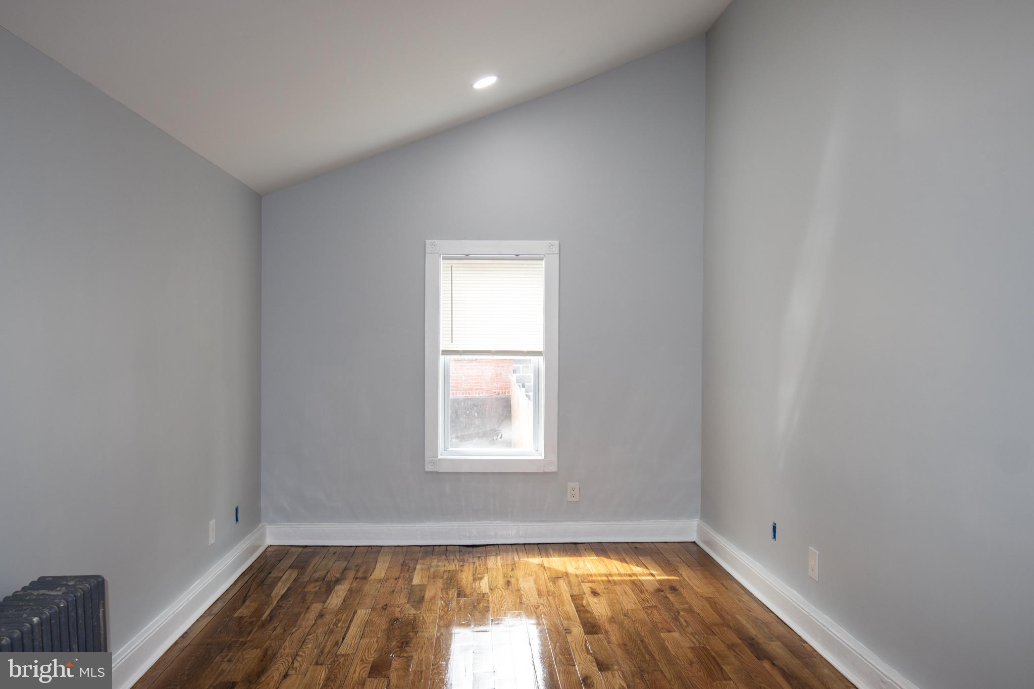 321 North 3rd Street Pottsville, PA 17901 - Photo 28 of 40 an empty room with a window