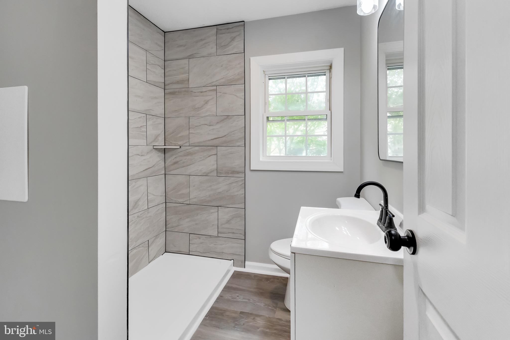 30536 Bennett Road Salisbury, MD 21804 - Photo 13 of 27 Modern bathroom with sleek finishes.