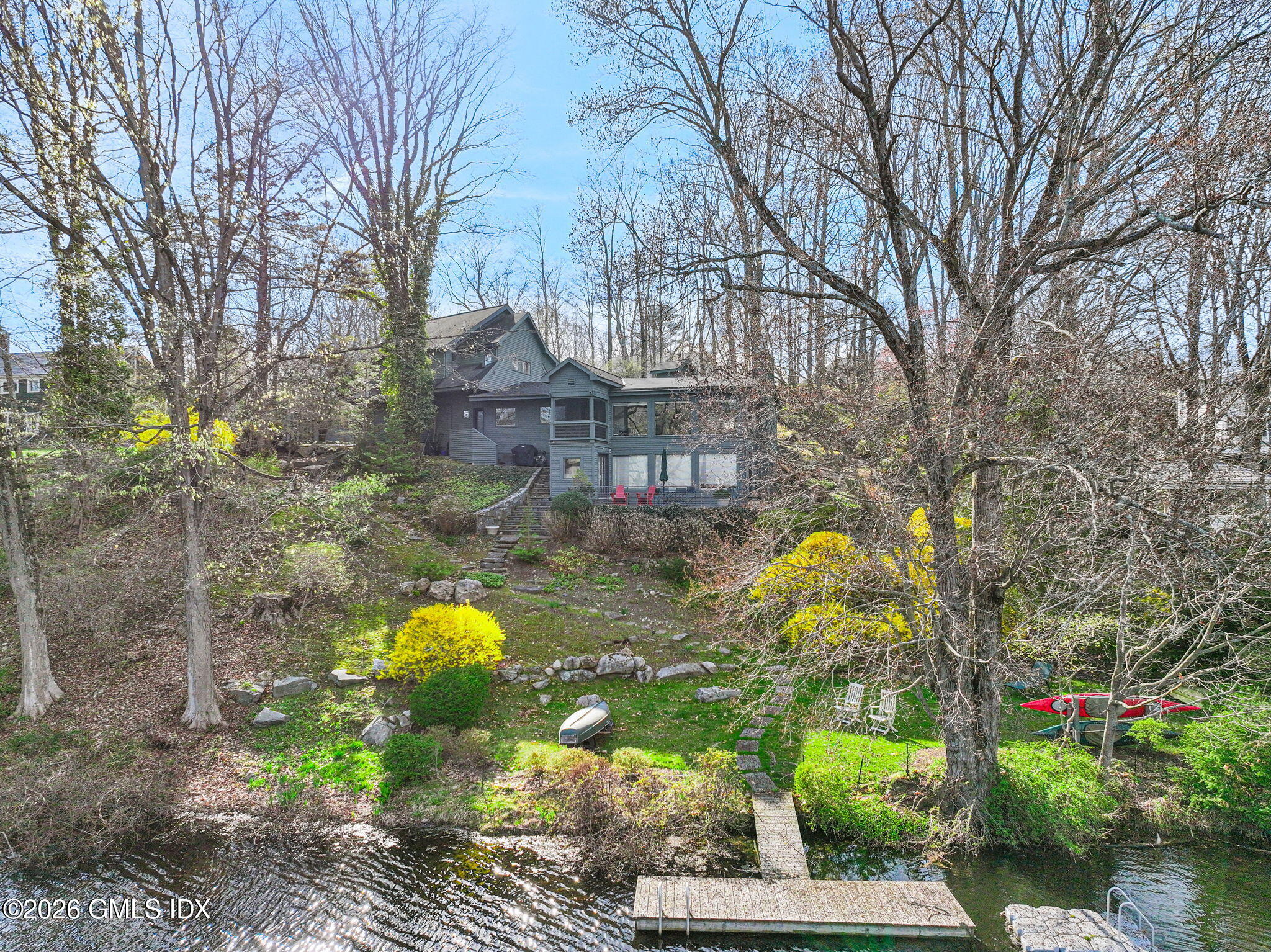 185 Valley Road Cos Cob, CT 06807 - Photo 36 of 38 a backyard of a house with lots of green space