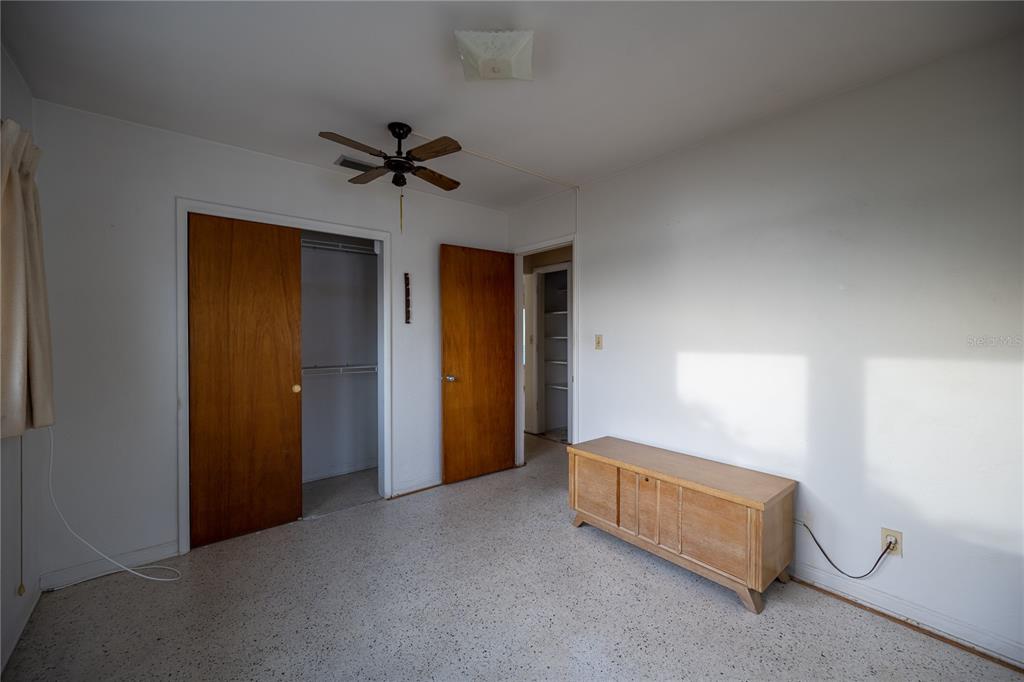 1425 Corey Way South South Pasadena, FL 33707 - Photo 21 of 34 a view of room with a ceiling fan