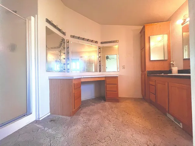 a room with a window and a sink