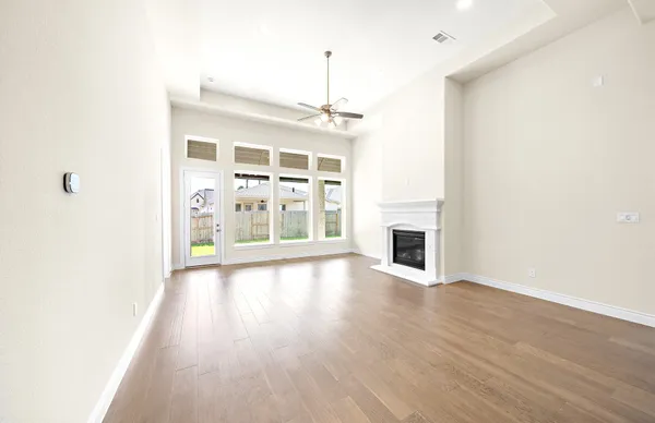 a view of a livingroom with wooden floor