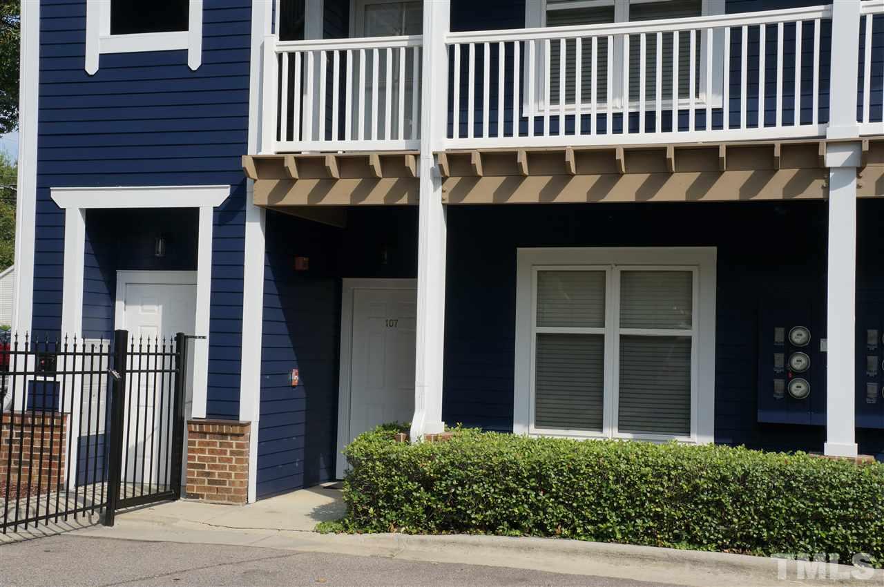 508 South Person Street, Unit 107 Raleigh, NC 27601 - Photo 1 of 24 a front view of a house with a balcony