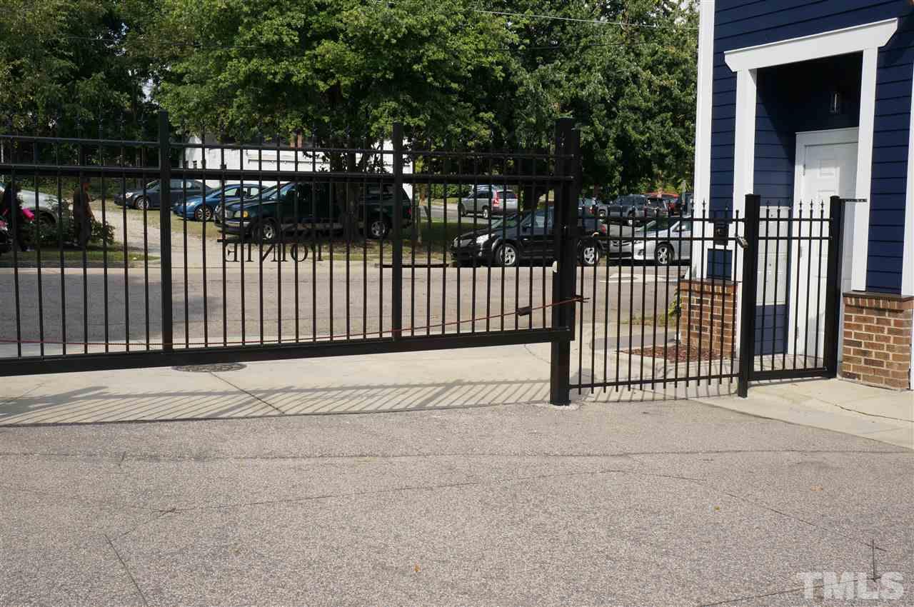 508 South Person Street, Unit 107 Raleigh, NC 27601 - Photo 2 of 24 a view of a balcony with fence