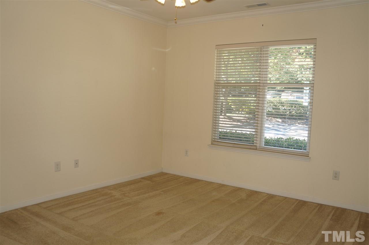 508 South Person Street, Unit 107 Raleigh, NC 27601 - Photo 17 of 24 a view of an empty room with a window