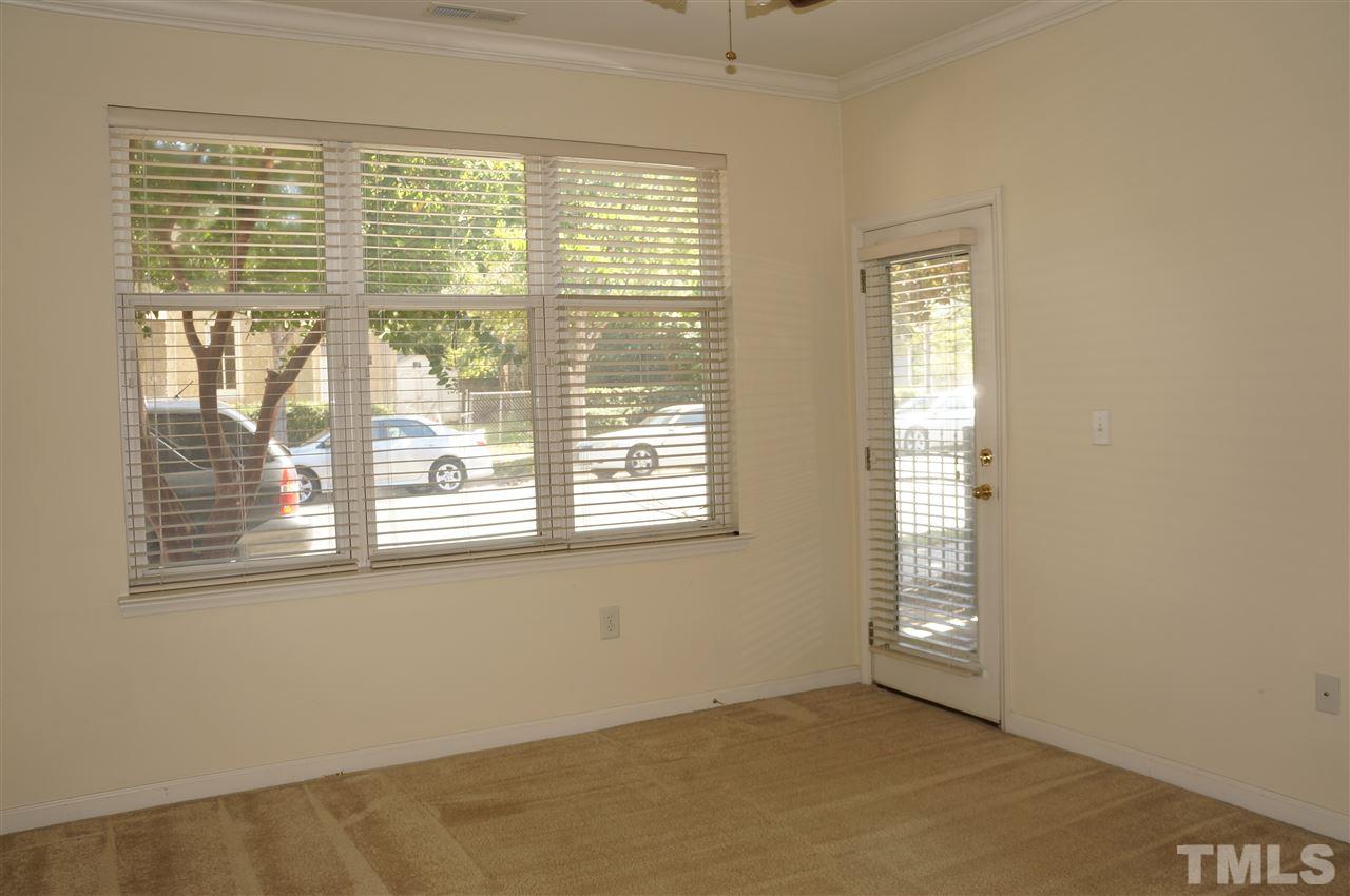 508 South Person Street, Unit 107 Raleigh, NC 27601 - Photo 18 of 24 an empty room with a window