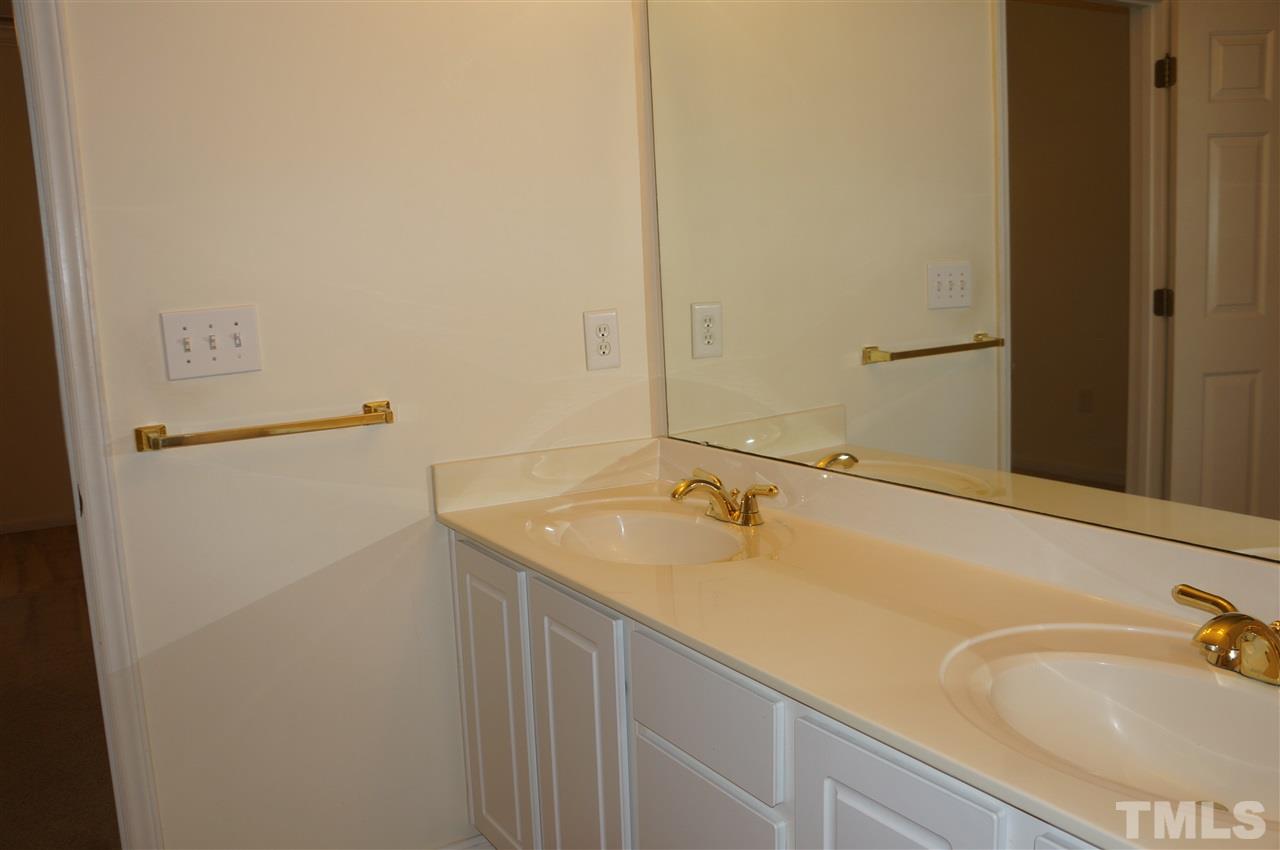 508 South Person Street, Unit 107 Raleigh, NC 27601 - Photo 20 of 24 a bathroom with a sink and a bathtub