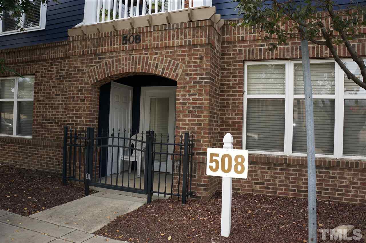 508 South Person Street, Unit 107 Raleigh, NC 27601 - Photo 7 of 24 a front view of a building with street