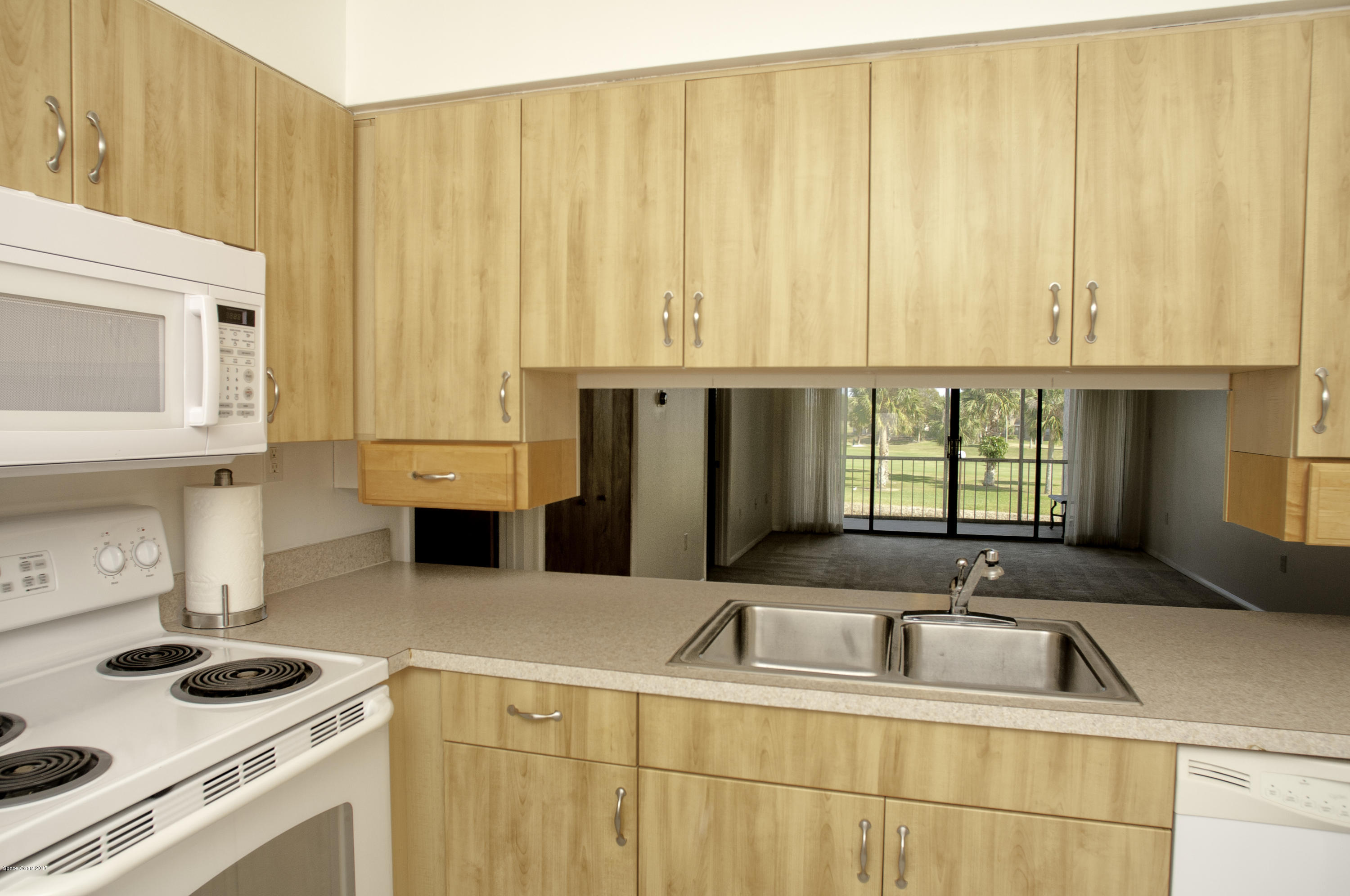 2727 North Wickham Road, Unit 2035 Melbourne, FL 32935 - Photo 4 of 26 Kitchen 2