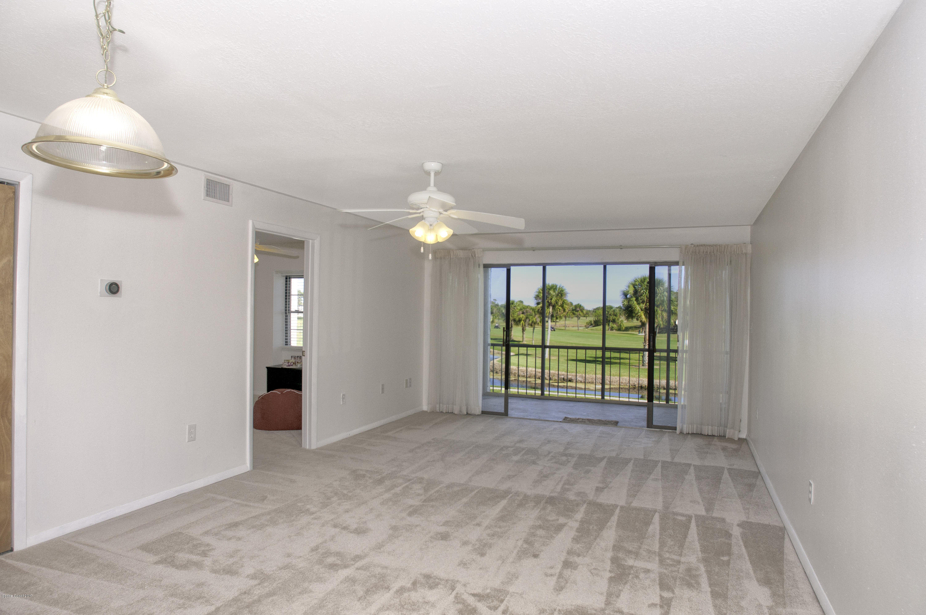 2727 North Wickham Road, Unit 2035 Melbourne, FL 32935 - Photo 5 of 26 Livingroom