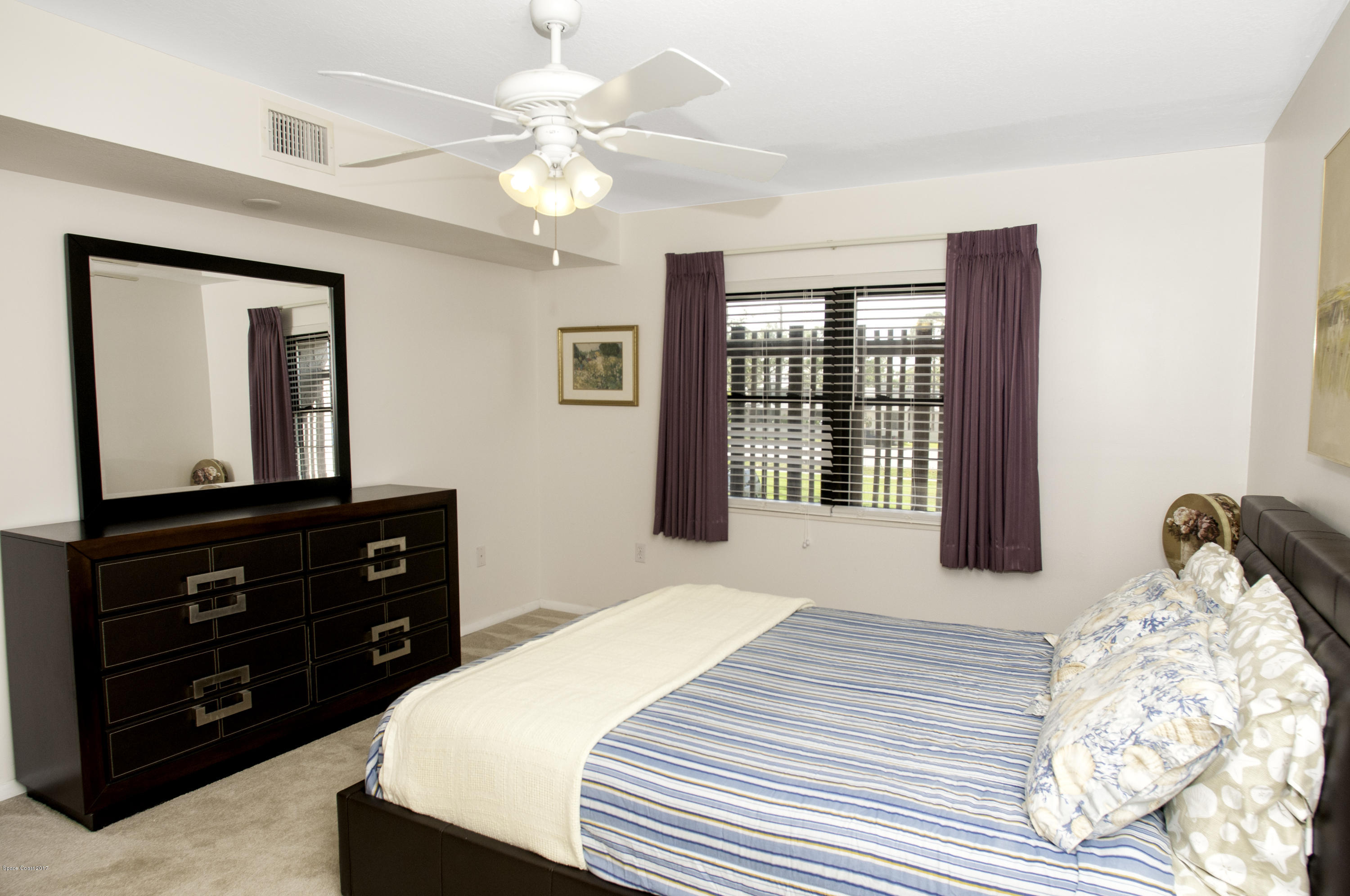 2727 North Wickham Road, Unit 2035 Melbourne, FL 32935 - Photo 7 of 26 Master Bedroom