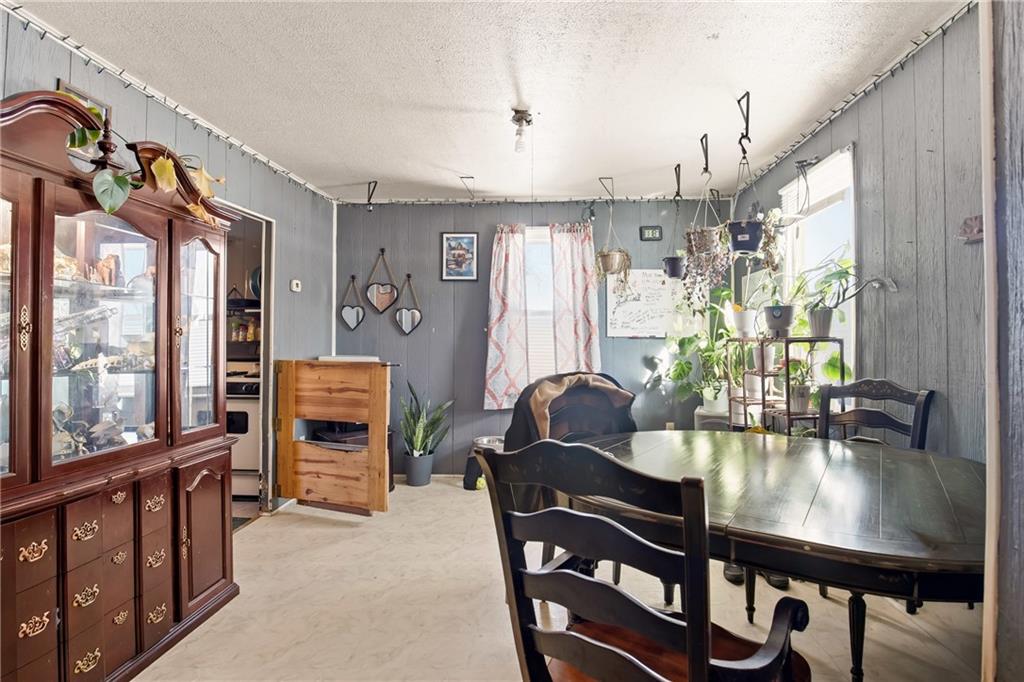 108 Foster Lane Markleton, PA 15551 - Photo 11 of 33 a dining room with furniture and window