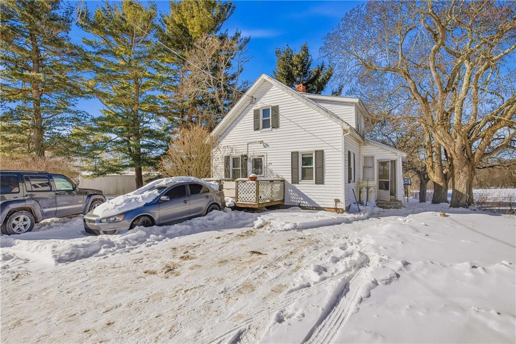 108 Foster Lane Markleton, PA 15551 - Photo 2 of 33 a view of a house with a yard covered in snow