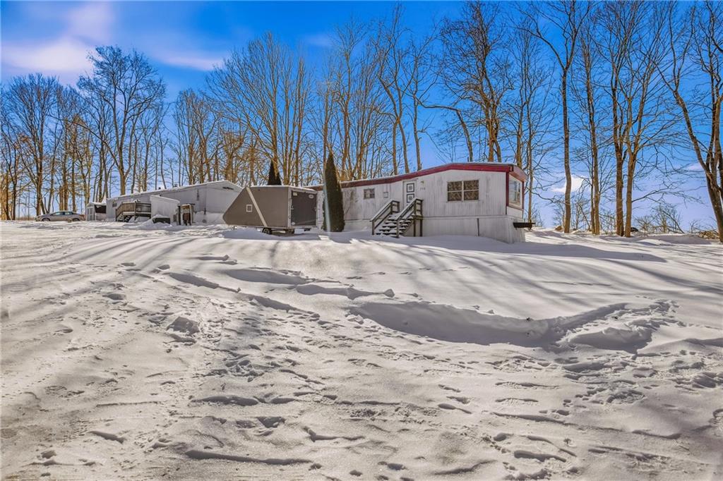 108 Foster Lane Markleton, PA 15551 - Photo 22 of 33 a view of a house with snow on the road