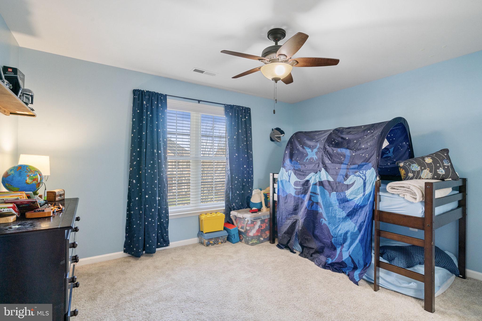 4016 Sapling Way Triangle, VA 22172 - Photo 32 of 56 a bed room with a bed and a window