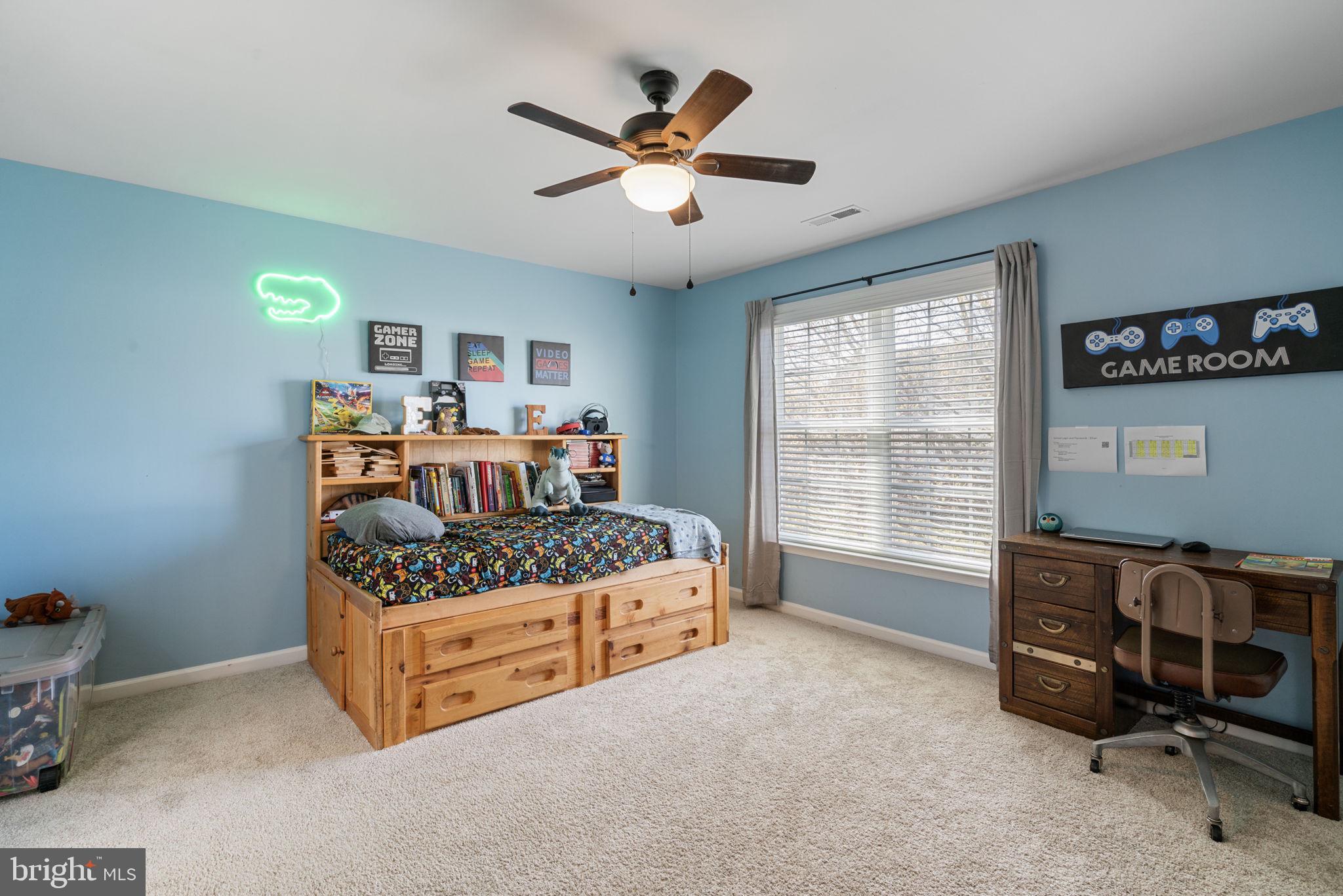 4016 Sapling Way Triangle, VA 22172 - Photo 34 of 56 a bed room with furniture and a window