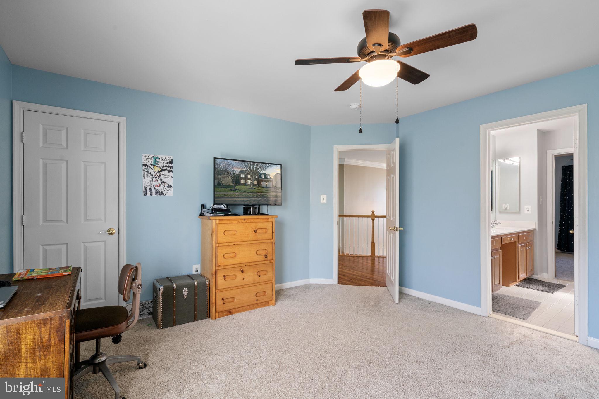 4016 Sapling Way Triangle, VA 22172 - Photo 35 of 56 a bedroom with furniture and a window