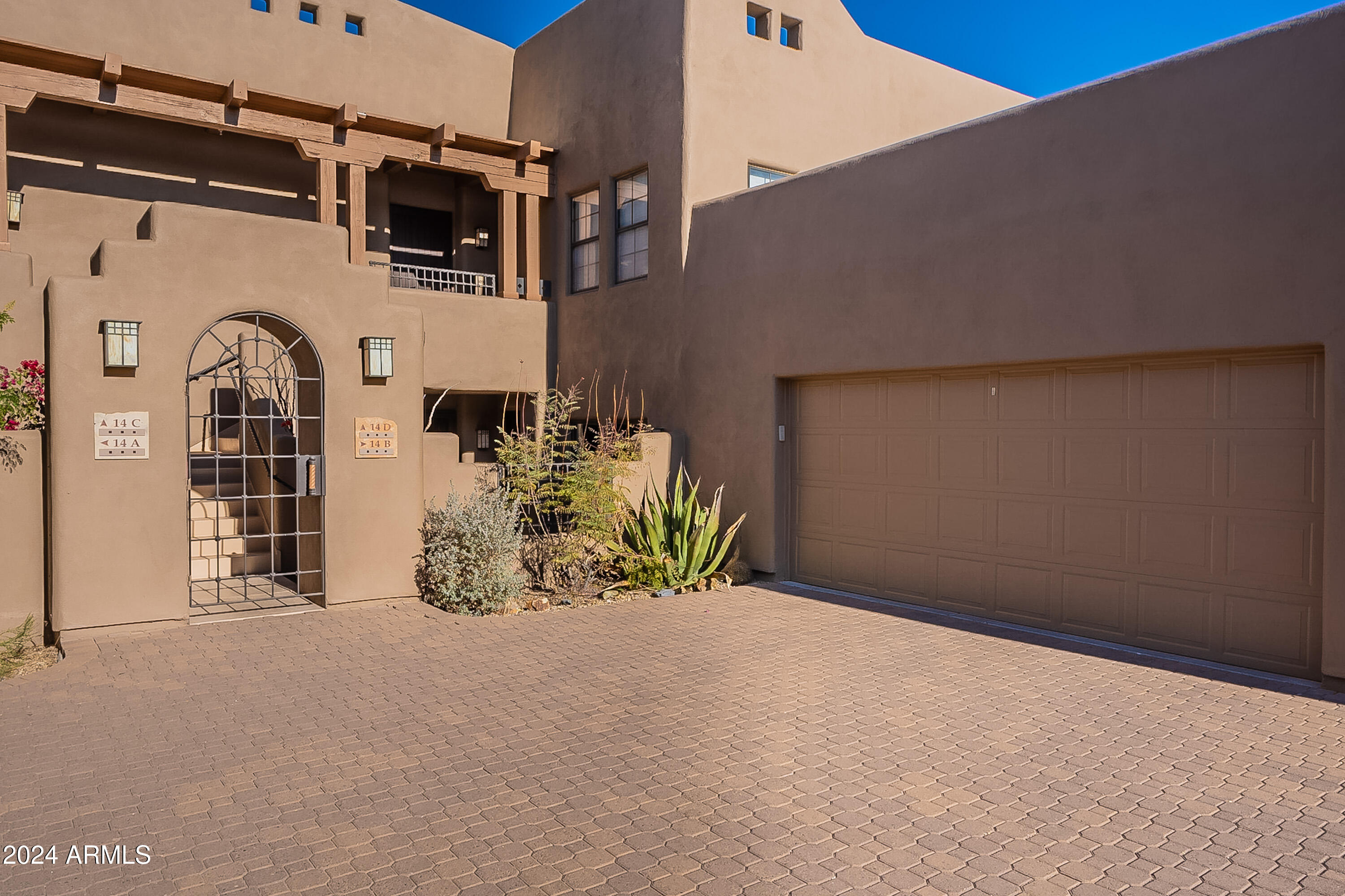 36601 North Mule Train Road, Unit B14 Carefree, AZ 85377 - Photo 64 of 67 Welcoming courtyard gate