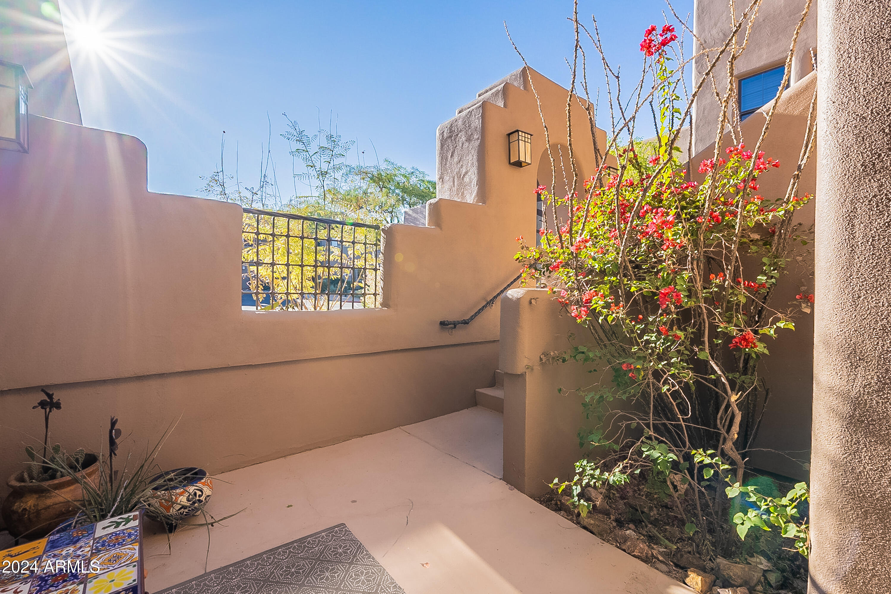 36601 North Mule Train Road, Unit B14 Carefree, AZ 85377 - Photo 65 of 67 Front courtyard patio