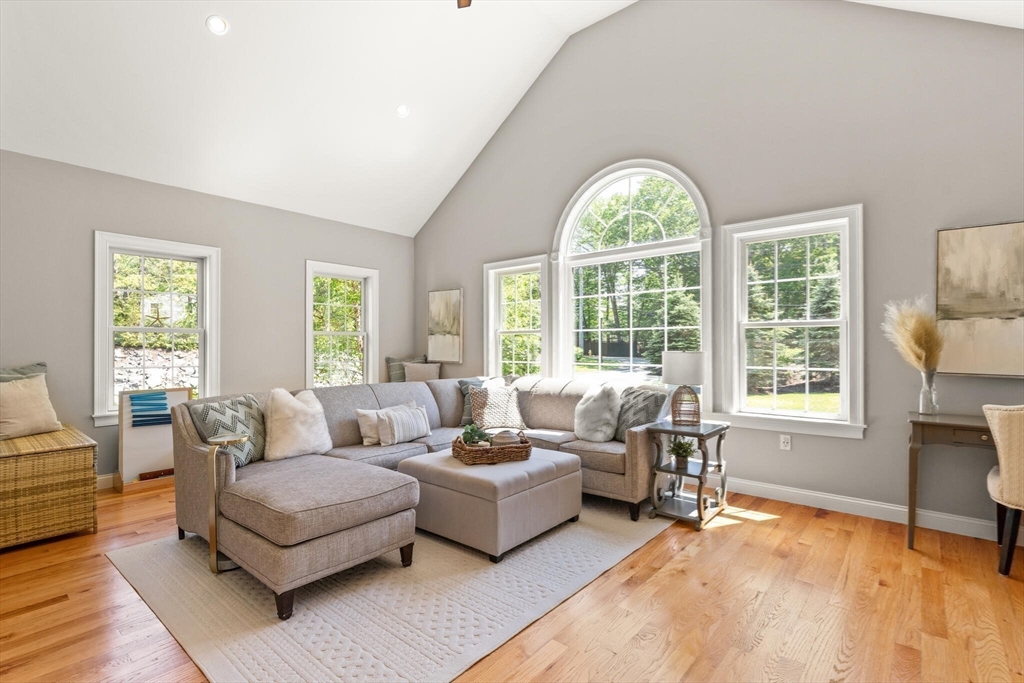 2 Leitner Way Middleton, MA 01949 - Photo 12 of 42 a living room with furniture and a large window