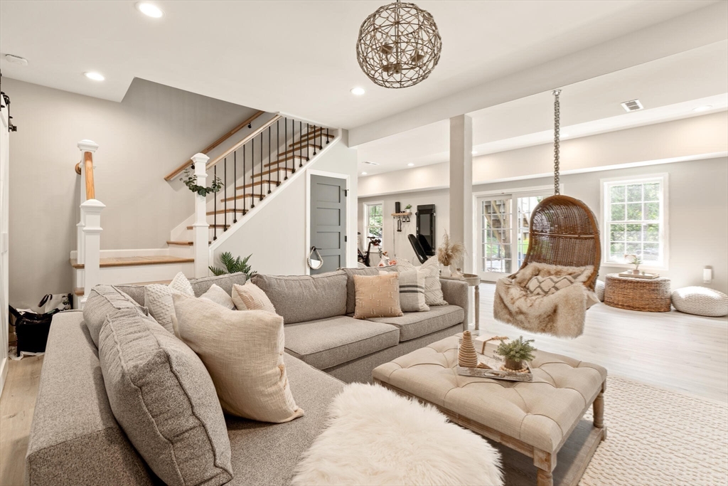 2 Leitner Way Middleton, MA 01949 - Photo 19 of 42 a living room with furniture and a large window
