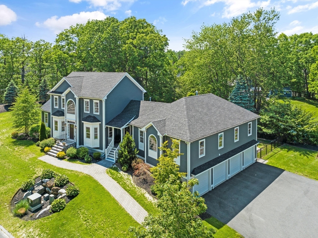 2 Leitner Way Middleton, MA 01949 - Photo 2 of 42 a aerial view of a house with a big yard plants and large trees