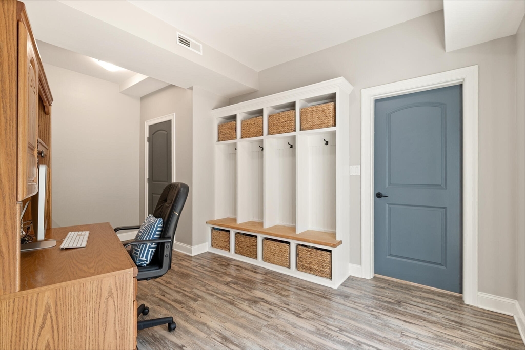 2 Leitner Way Middleton, MA 01949 - Photo 23 of 42 a view of a workspace with furniture and wooden floor