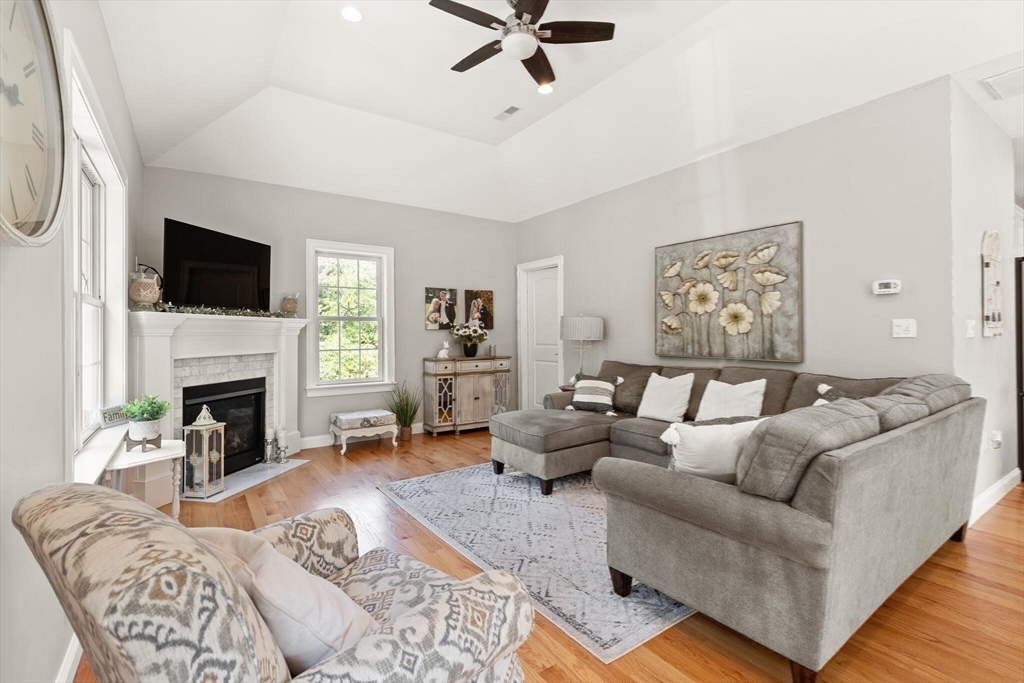 2 Leitner Way Middleton, MA 01949 - Photo 28 of 42 a living room with furniture fireplace and a flat screen tv