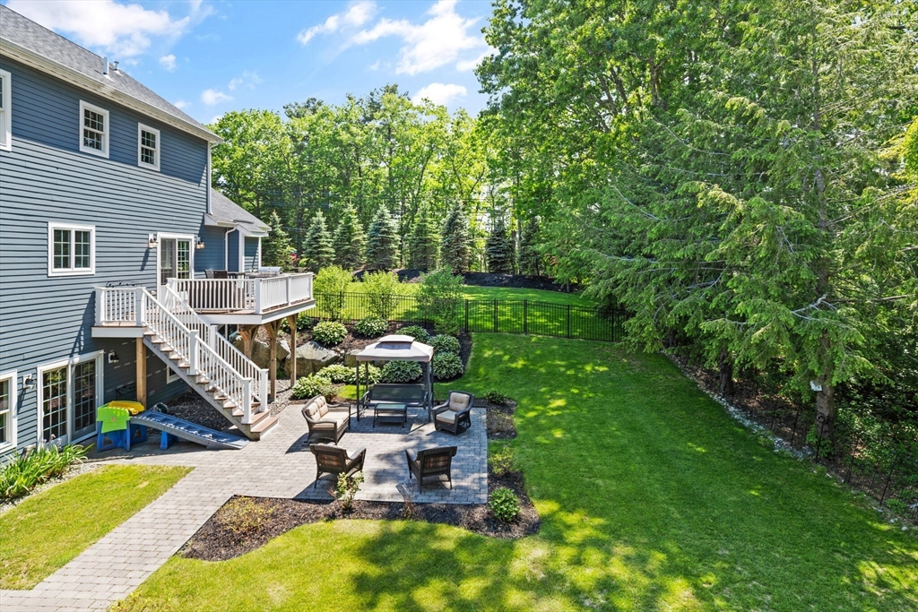 2 Leitner Way Middleton, MA 01949 - Photo 36 of 42 a view of a backyard with sitting area