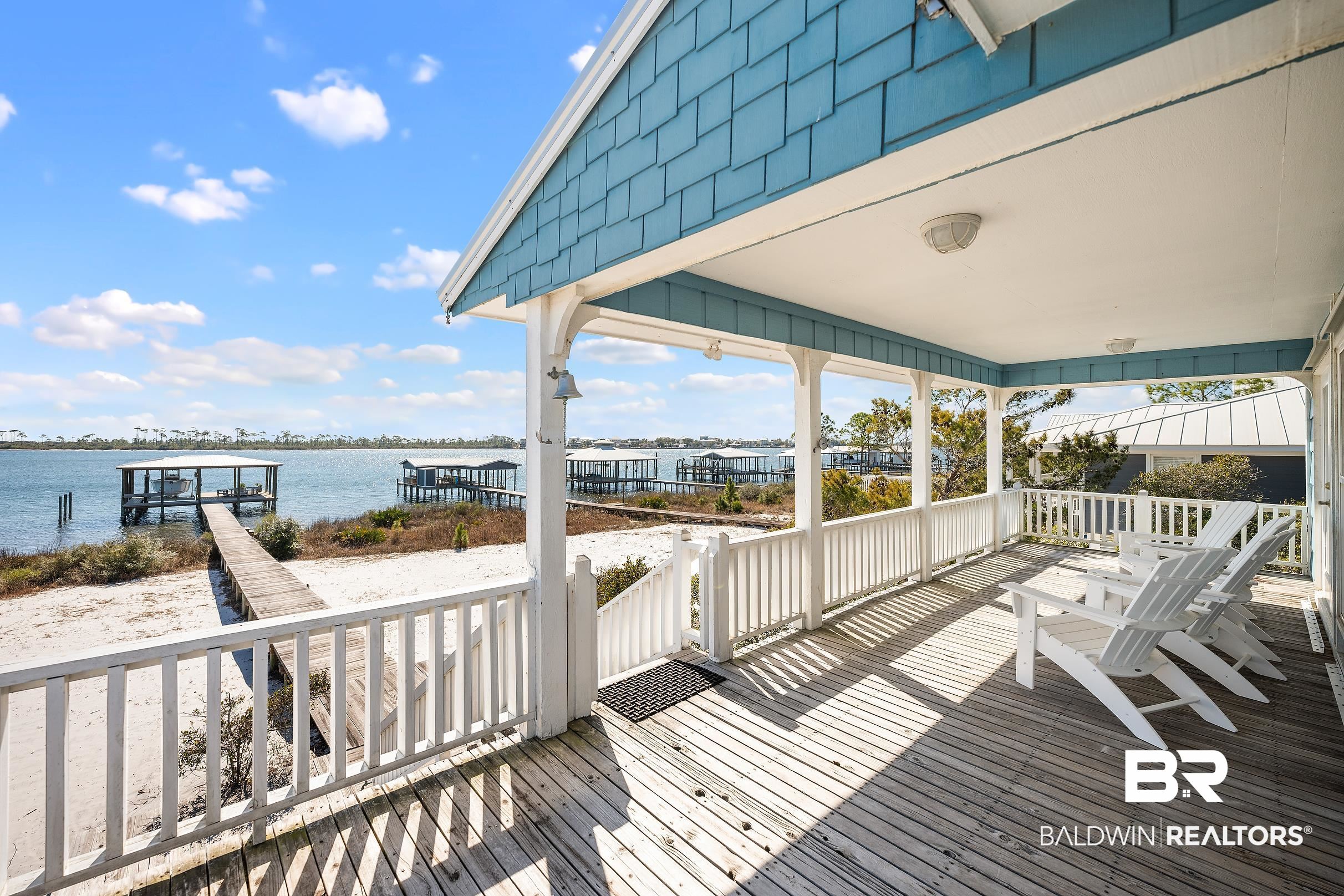 32620 River Road Orange Beach, AL 36561 - Photo 35 of 60 Wooden terrace featuring a water view