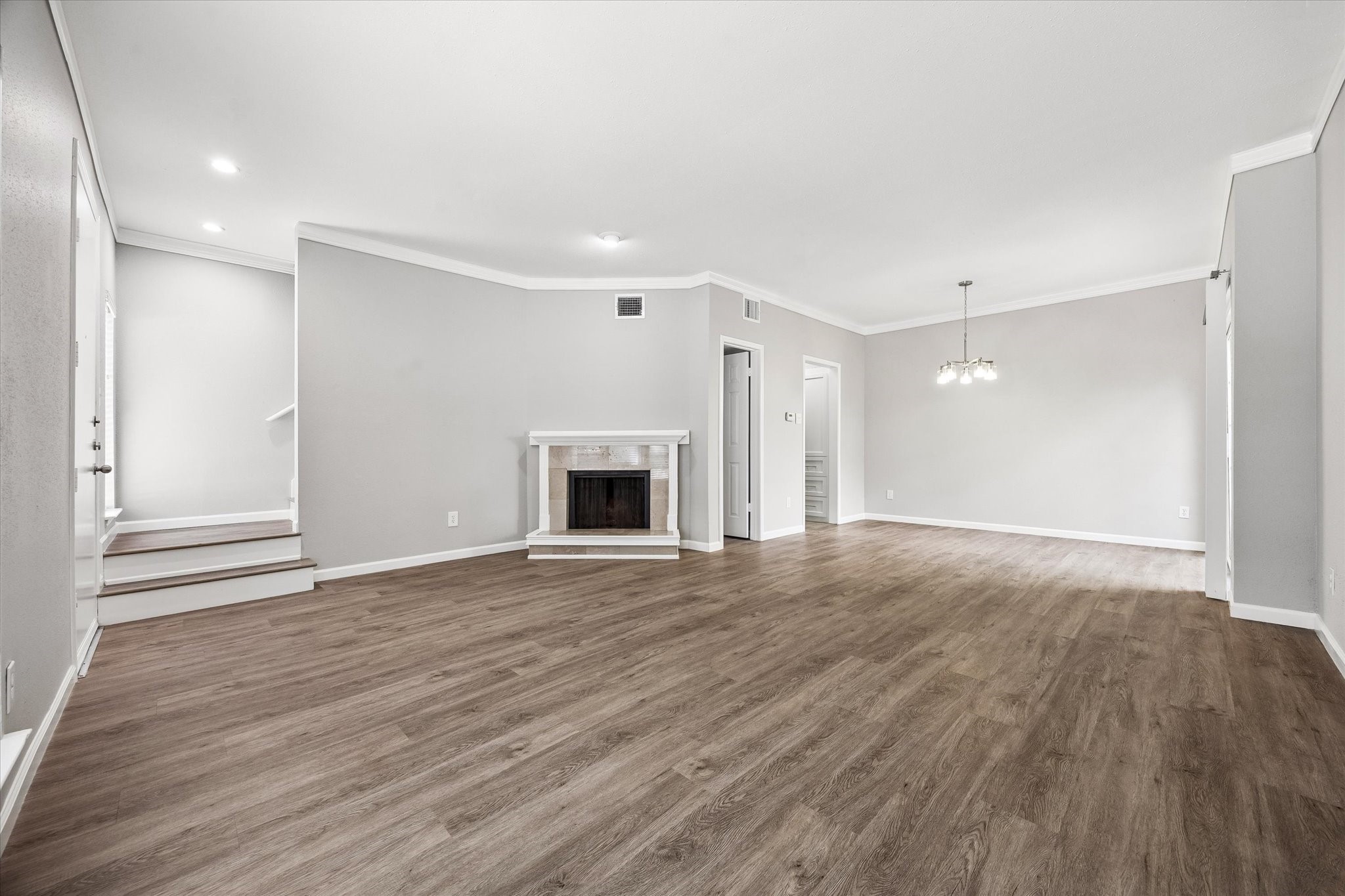 Spacious Living and Dining Rooms.  Woodburning Fireplace