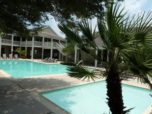 a very nice looking dining room with furniture