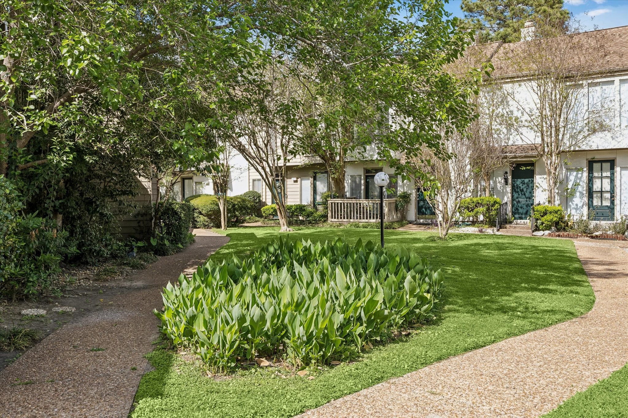 2100 Tanglewilde Street, Unit 702 Houston, TX 77063 - Photo 3 of 19 One of Two Courtyards Within A Few Steps