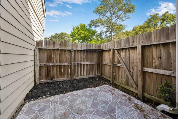 a view of a wooden fence